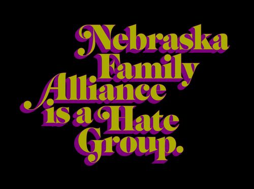 text reading Nebraska Family Alliance is a Hate Group, in yellow and purple stylized lettering on a black background